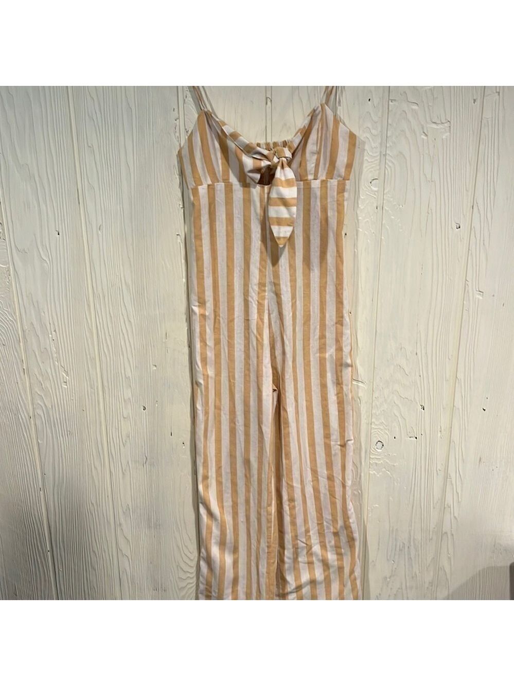 Cisono jumpsuit with tie peek at breast size Medium